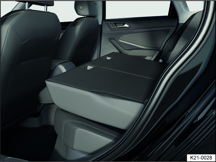 Fig. 70 Rear bench seat: Rear seat backrest folded forwards.