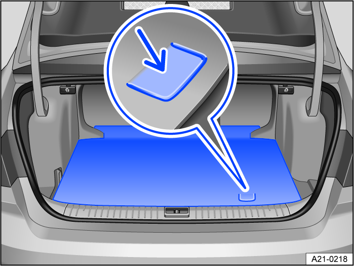 Fig. 120 In the luggage compartment: opening the luggage compartment floor.
