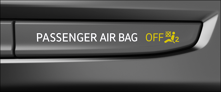 Fig. 27 In the center console: indicator light for the deactivated passenger front airbag.