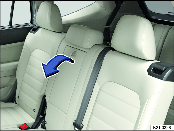 Fig. 86 Folding center armrest in the rear.