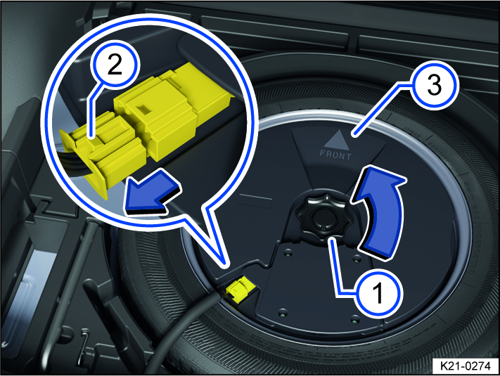 Fig. 177 In the luggage compartment: Removing the subwoofer.