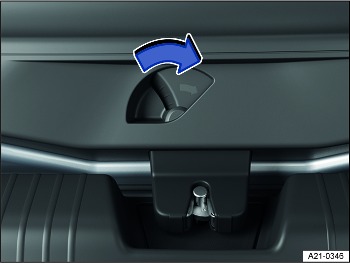 Fig. 61 In the luggage compartment: mechanically unlocking the trunk lid using the emergency release.