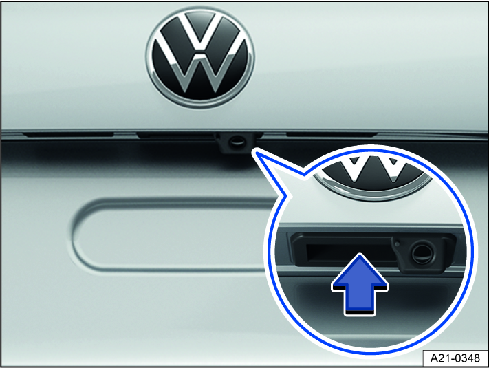 Fig. 59 In the trunk lid: button to open the trunk lid.