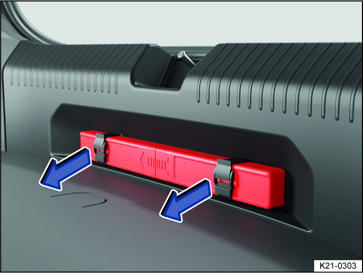 Fig. 43 Underneath the load sill: holder for the warning triangle.
